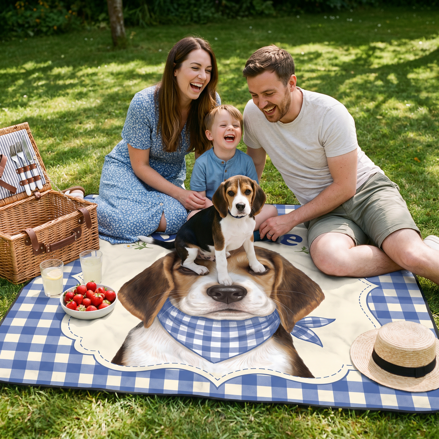 Family picnic in the garden on a personalised gingham beagle blanket with their puppy