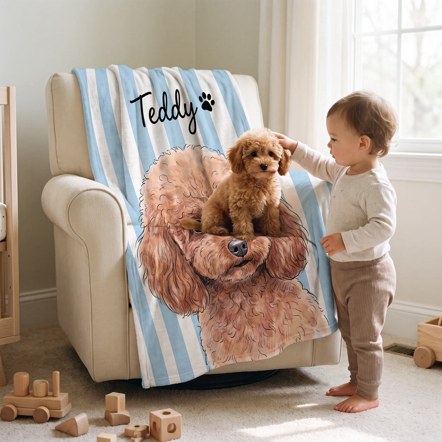 Toddler stroking a poodle puppy on a lap size striped blanket in a nursery