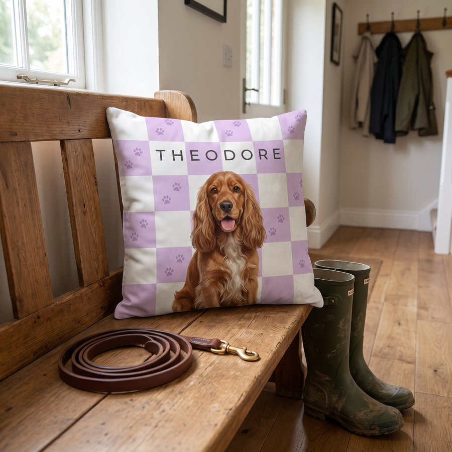 Paw Print Checkerboard portrait cushion 26cm x 26cm being enjoyed at home