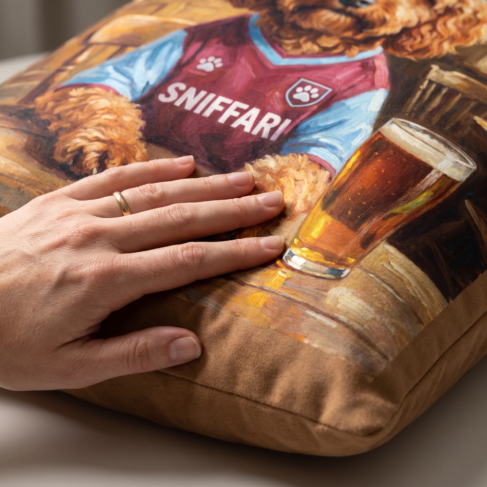 Close up of a hand on the soft-touch faux suede showing the Pawston Villa print