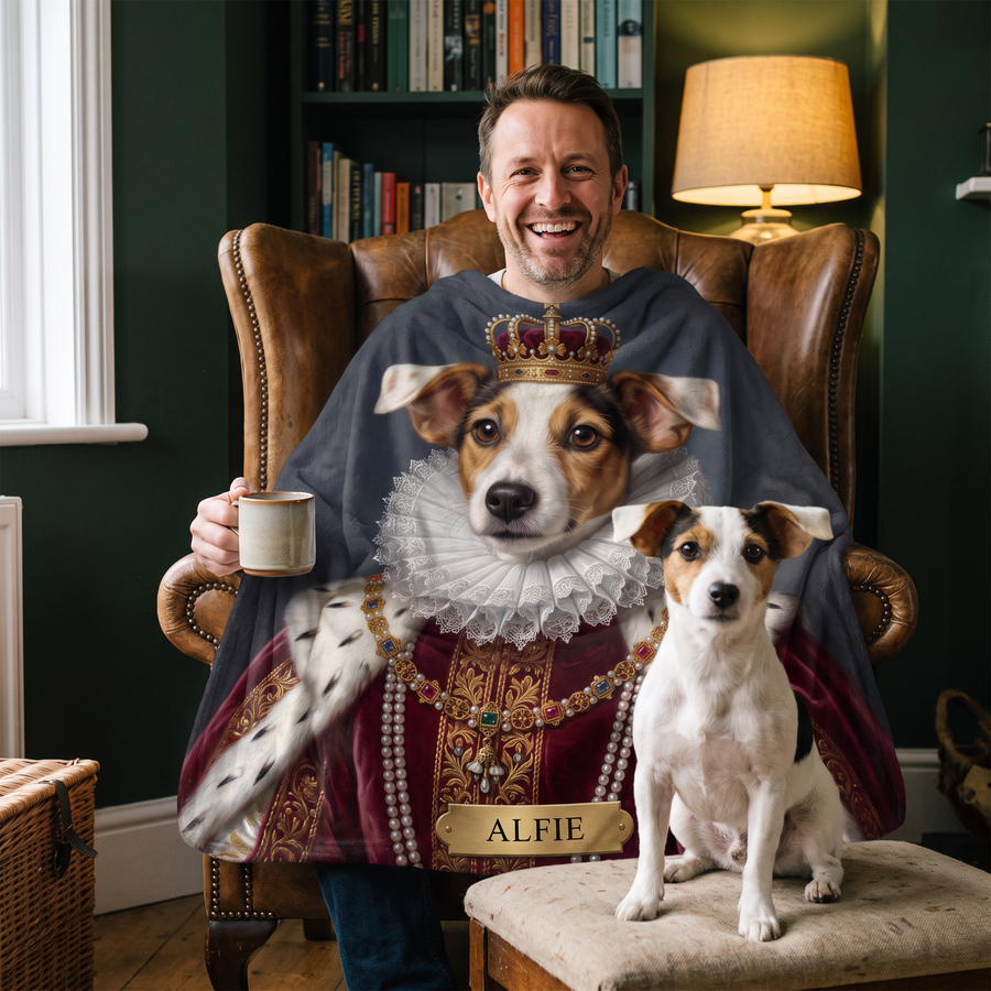 Man wearing a royal Jack Russell portrait blanket like a cape with his dog on the footstool