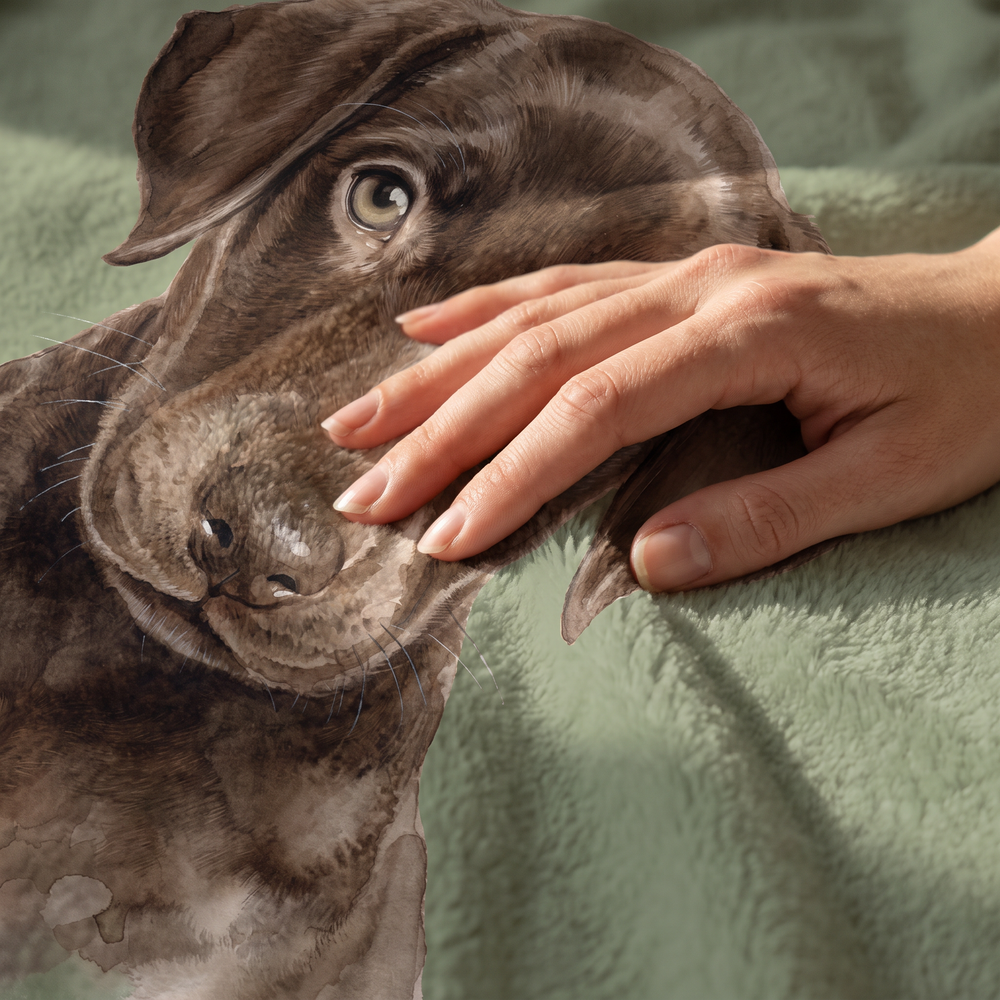 Close up of a hand on the ultra soft plush fleece showing the watercolour print